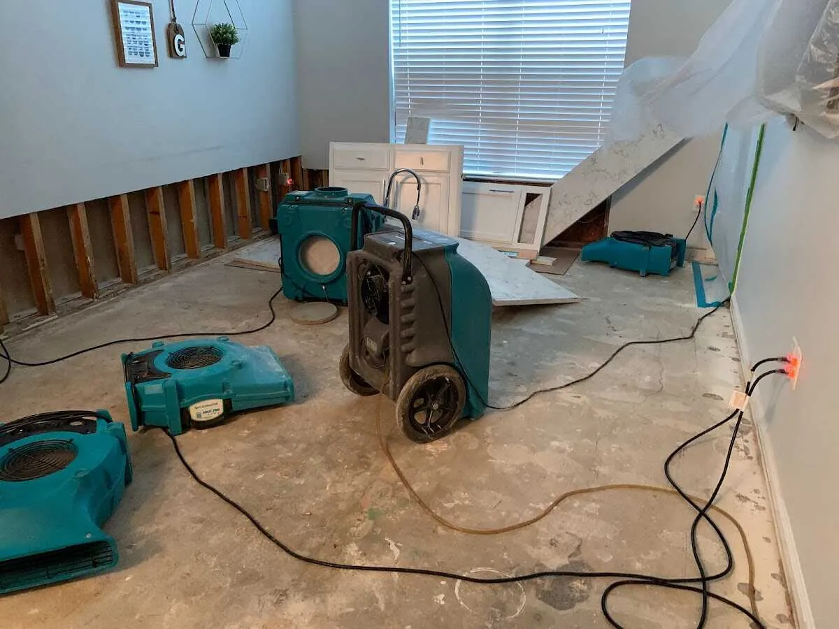 Dehumidifier in flood-cut room for Water Damage Restoration in Denham Springs