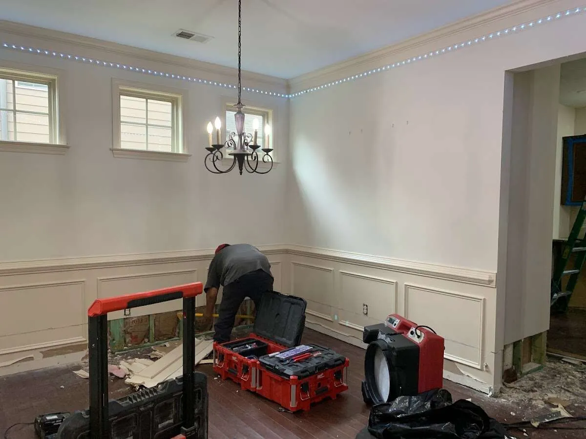 Restoration technician with professional equipment in Denham Springs